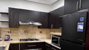 Private kitchen - ELITE New Modern 3BR Apartment (New Cairo)