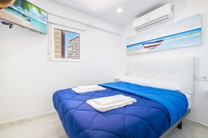 Een strijkplank/strijkijzer, gratis wifi, beddengoed