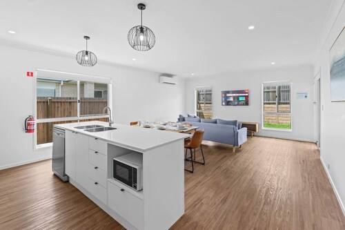 Family-Friendly 4BR Home with 3 Bathrooms & A/C