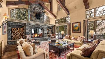 Smart TV, fireplace, books, stereo