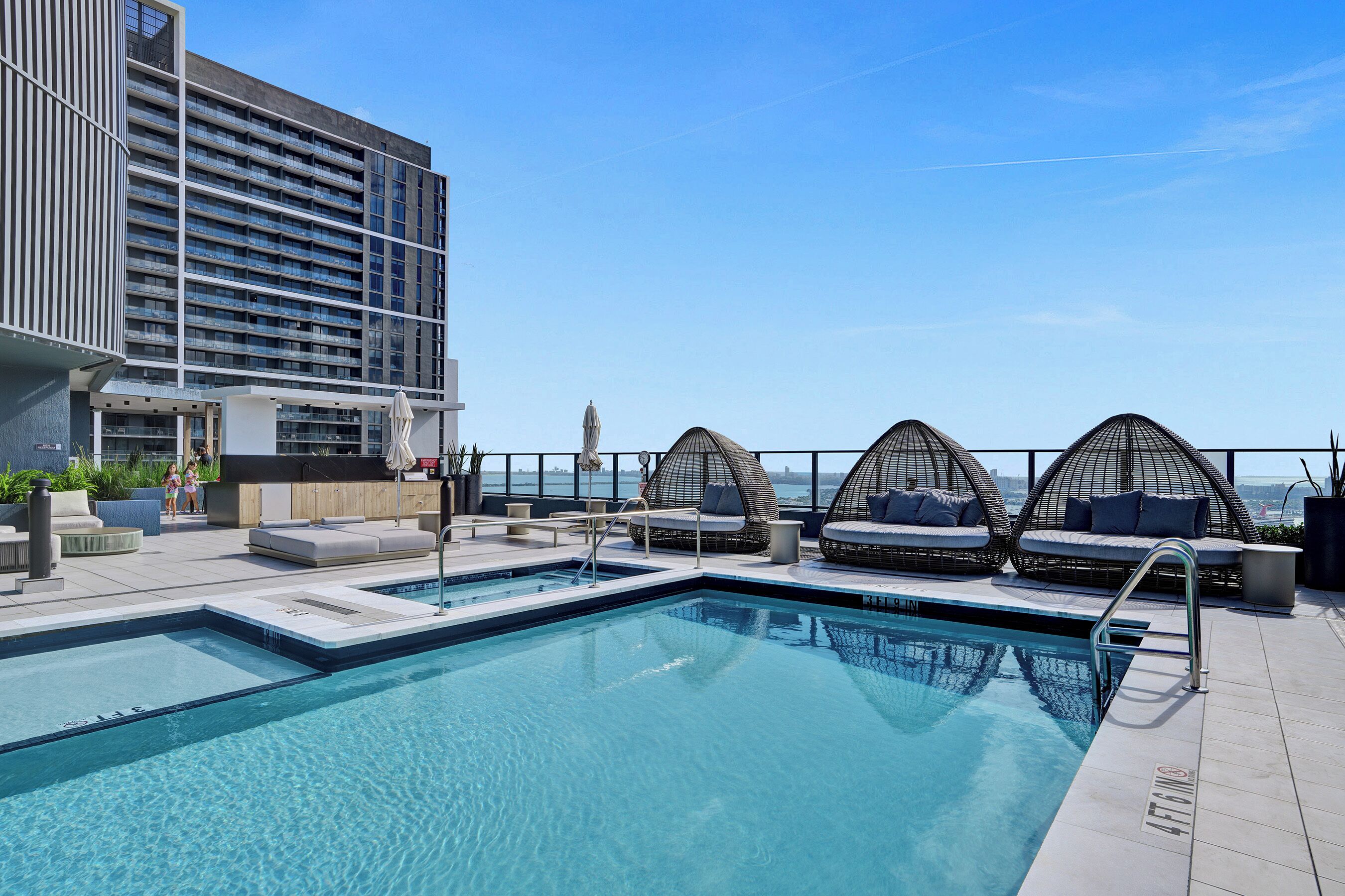 Outdoor pool, pool umbrellas, sun loungers
