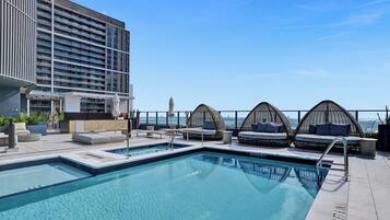 Outdoor pool, pool umbrellas, sun loungers