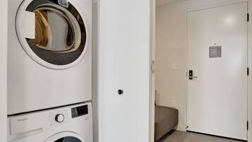 One Bedroom + Den Balcony Apartment | Laundry