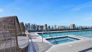 Outdoor pool, pool umbrellas, sun loungers