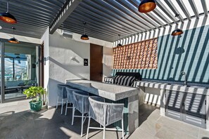 Outdoor dining - Alik: Studios with Partial Views to the Marina (Cruz de Huanacaxtle)