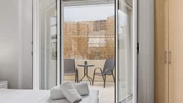 Familie appartement, balkon, uitzicht op tuin | Terras