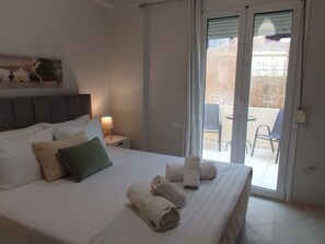 Familjelägenhet - balkong - utsikt mot trädgården