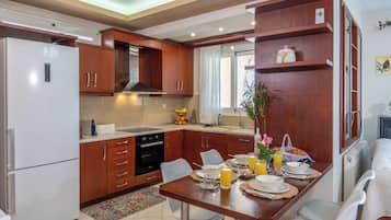 Family Apartment, Balcony, Garden View | Private kitchen | Full-sized fridge, microwave, oven, stovetop