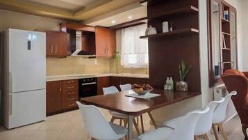 Family Apartment, Balcony, Garden View | Living area