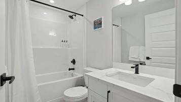 Shower, hair dryer, shampoo