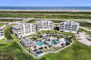 Exterior - Top floor condo overlooking Sunset Pool and San Luis Pass in Pointe West! (Galveston)