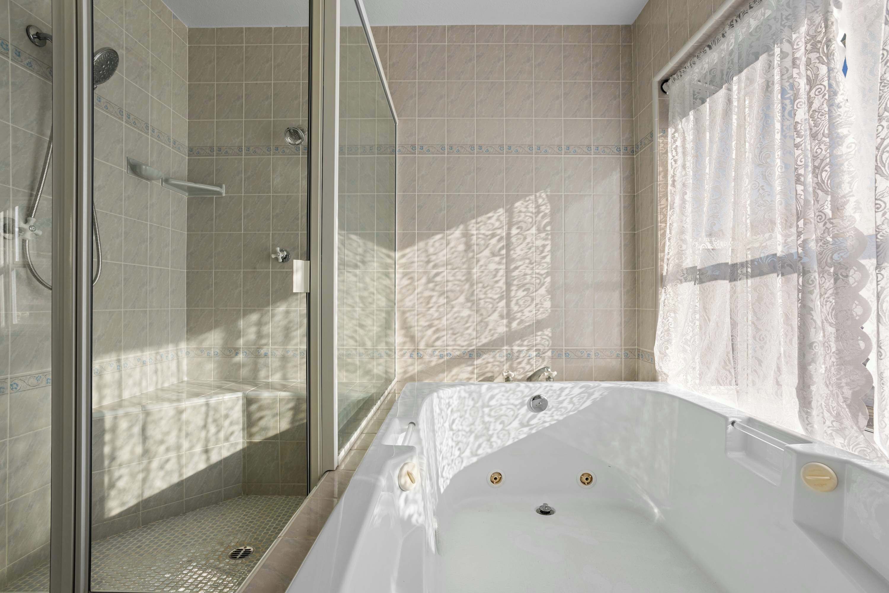 Shower, hair dryer, towels, shampoo