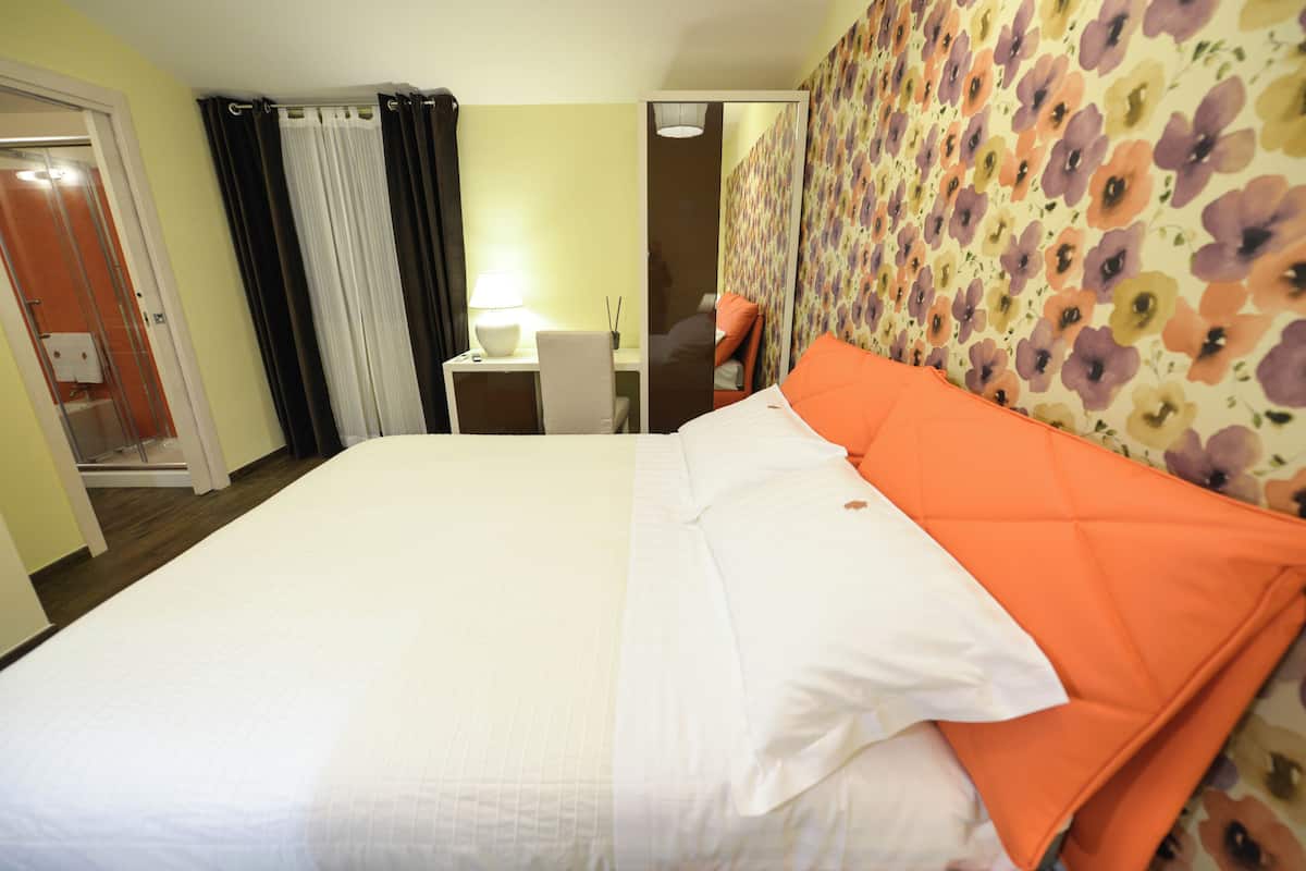 Quarto casal superior, vista para o jardim