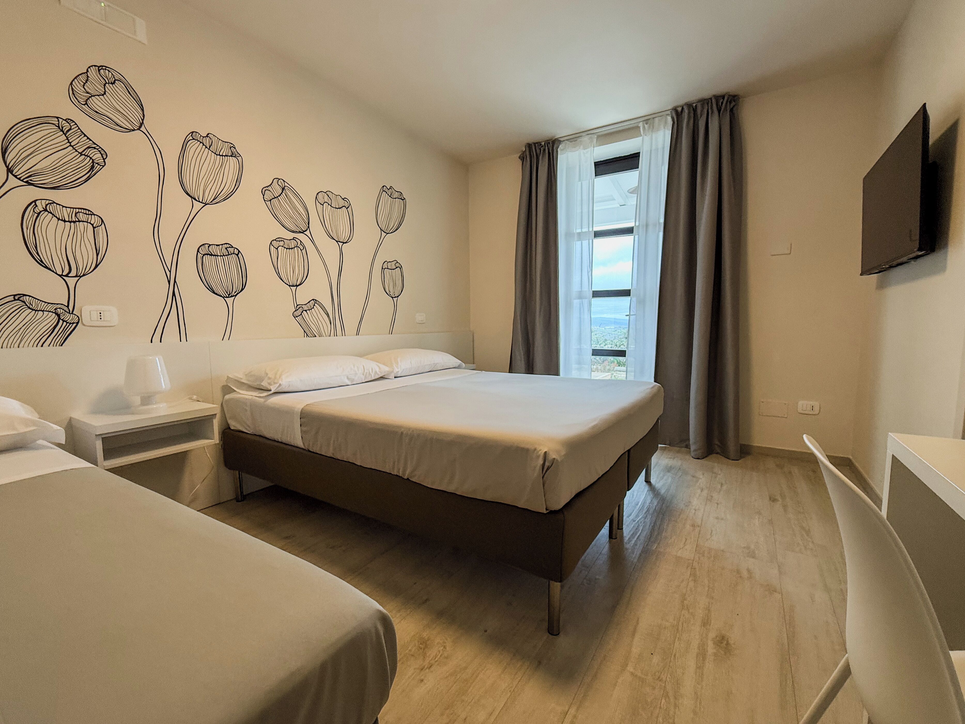 Deluxe Triple Room, Patio, Garden View