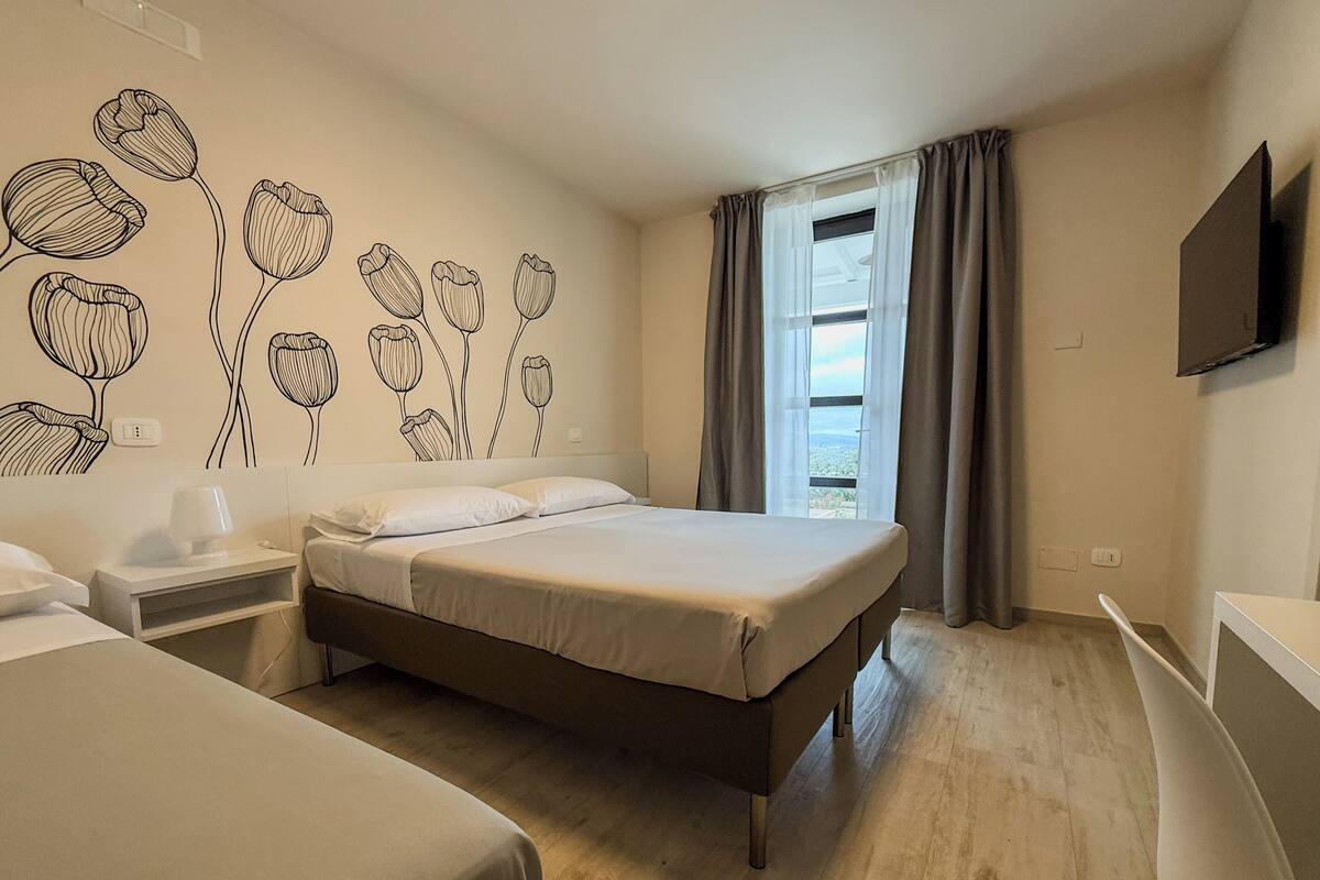 Deluxe Triple Room, Patio, Garden View