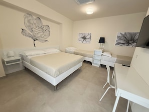 Deluxe Quadruple Room, Patio, Garden View