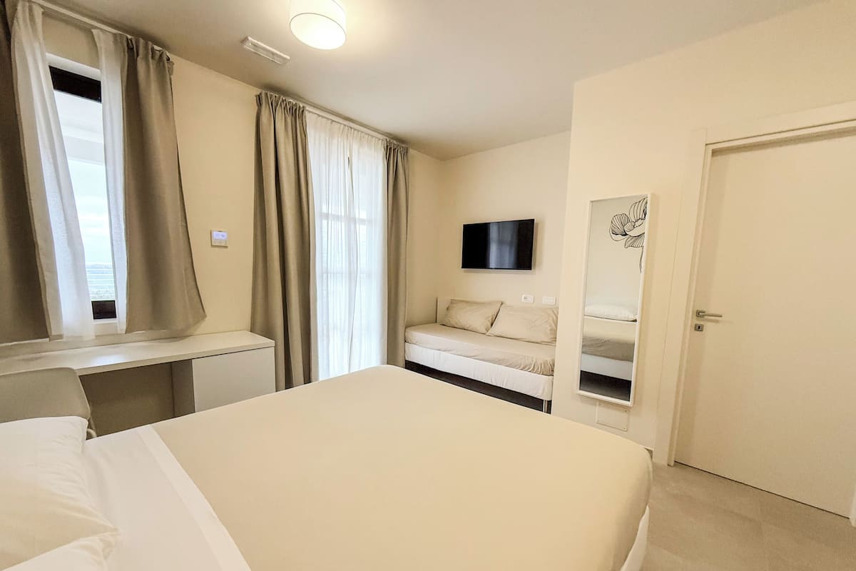 Deluxe Quadruple Room, Patio, Garden View