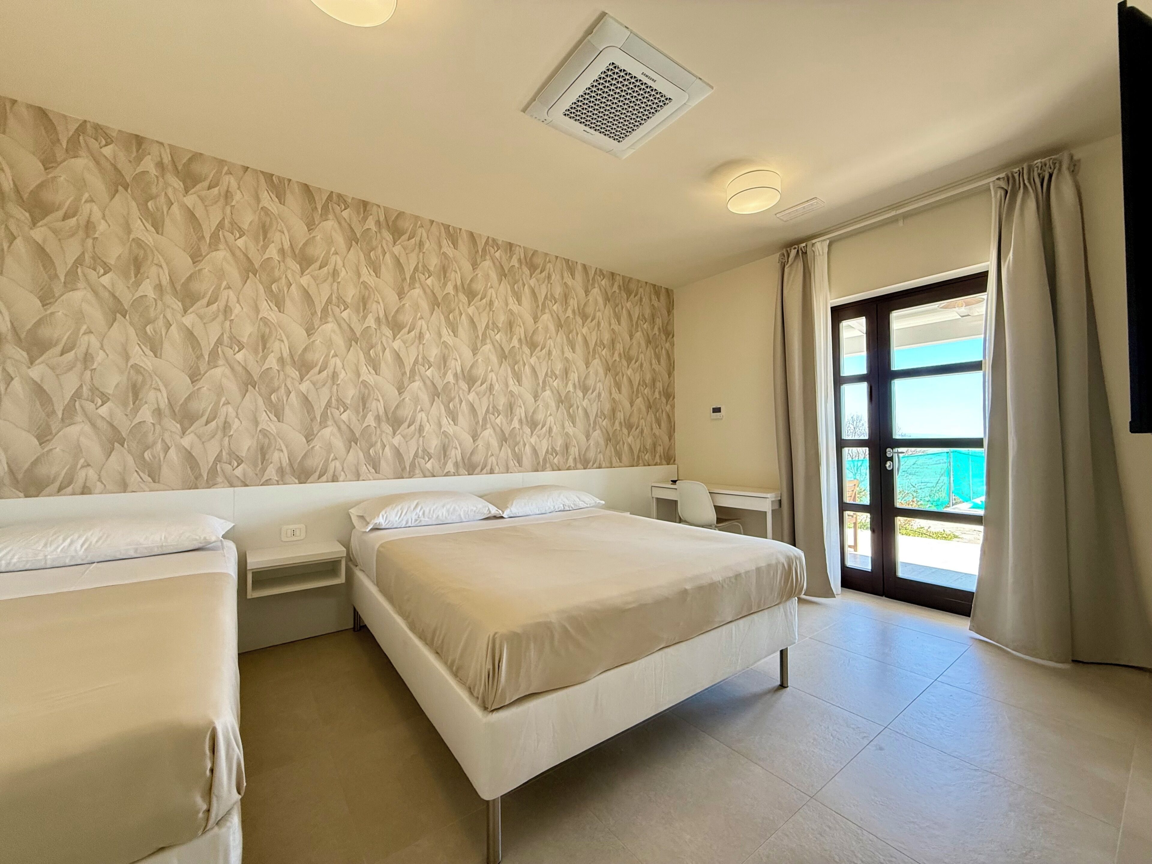 Deluxe Triple Room, Patio, Garden View