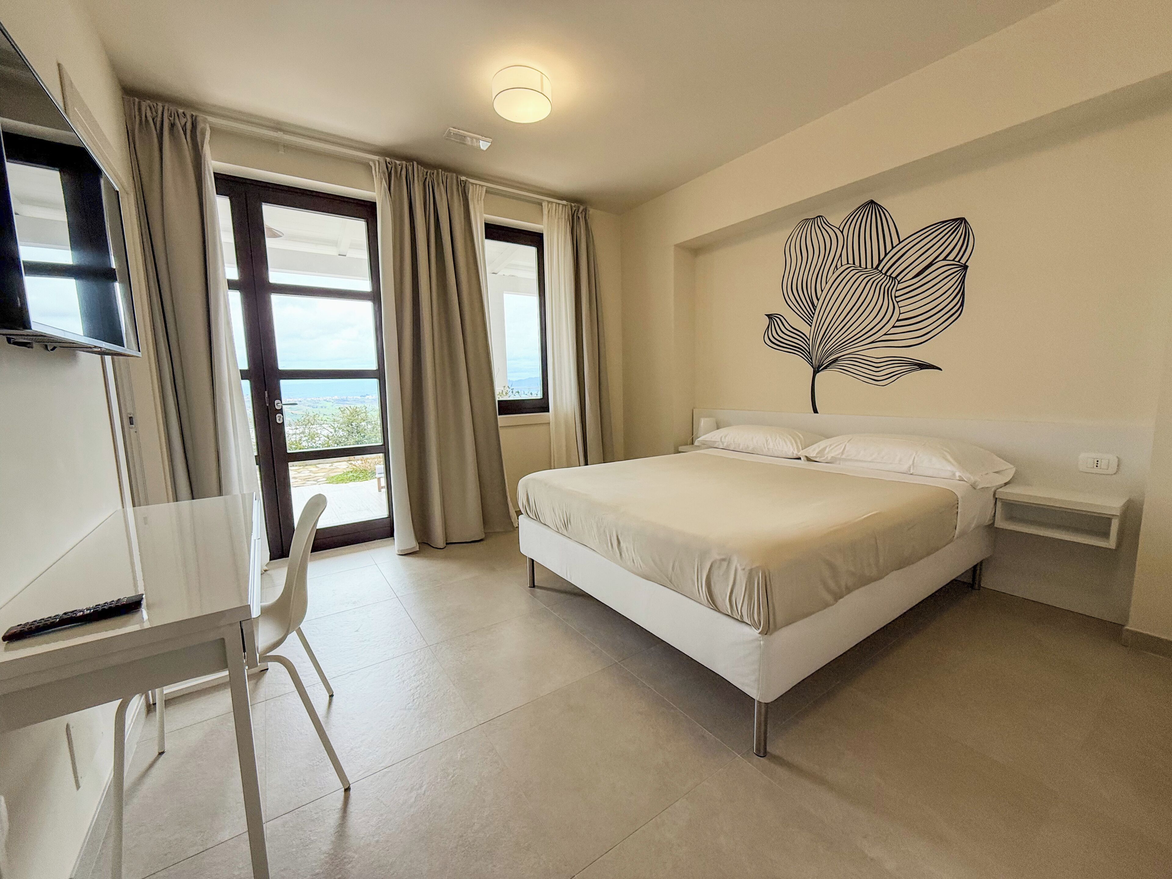 Deluxe Quadruple Room, Patio, Garden View