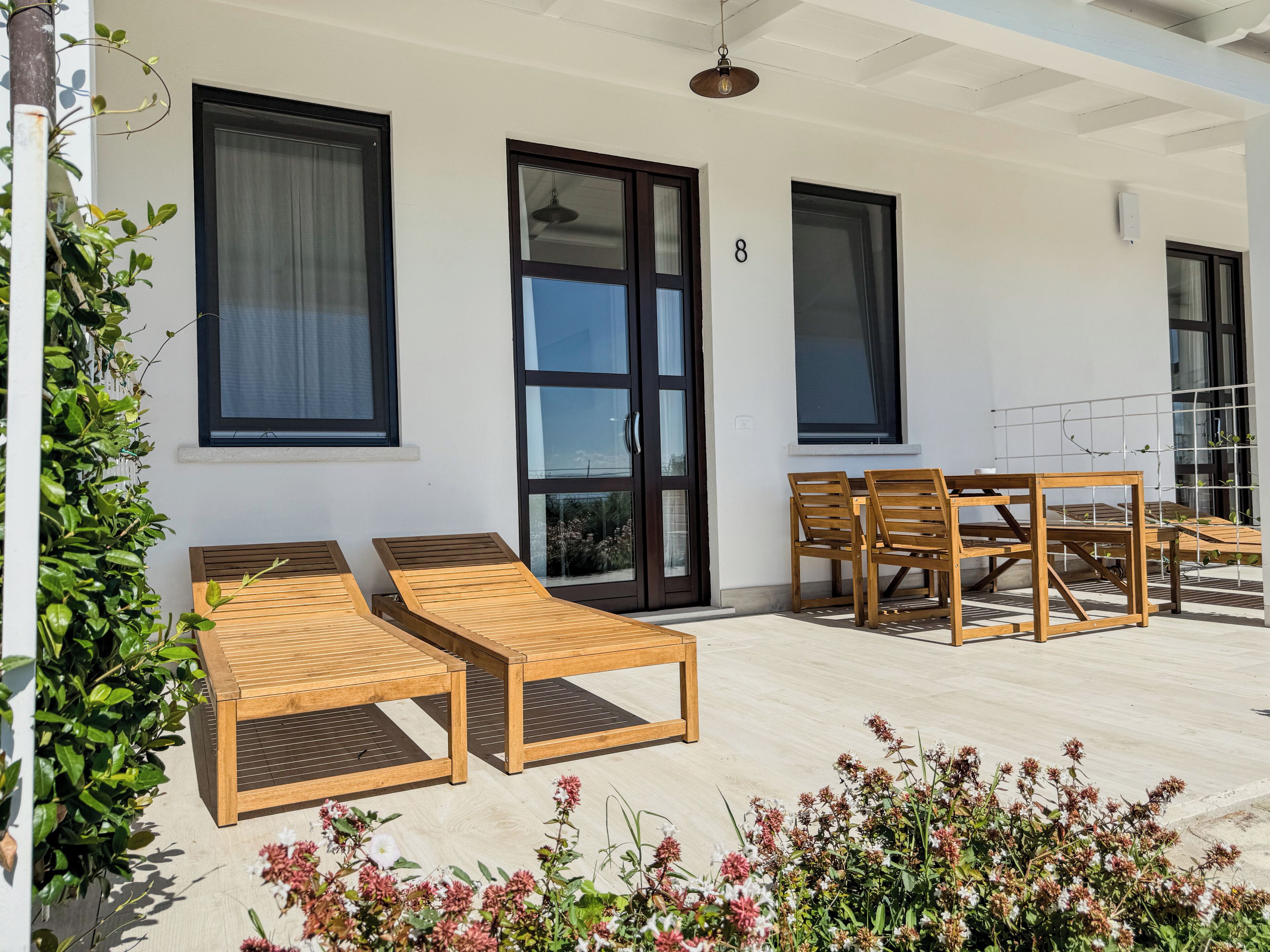 Deluxe Quadruple Room, Patio, Garden View | Outdoor dining