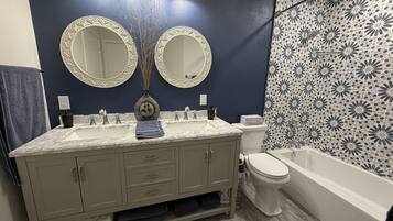 Hair dryer, towels, soap, toilet paper