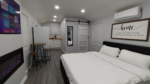 1 habitación, tabla de planchar con plancha, wifi y ropa de cama 