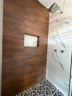 Shower, jetted bath, towels, soap