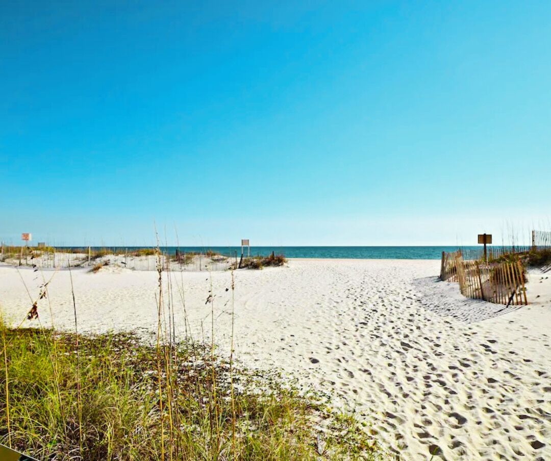 On the beach, sun loungers, beach towels