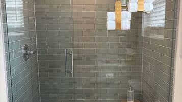 Shower, hair dryer, towels, soap