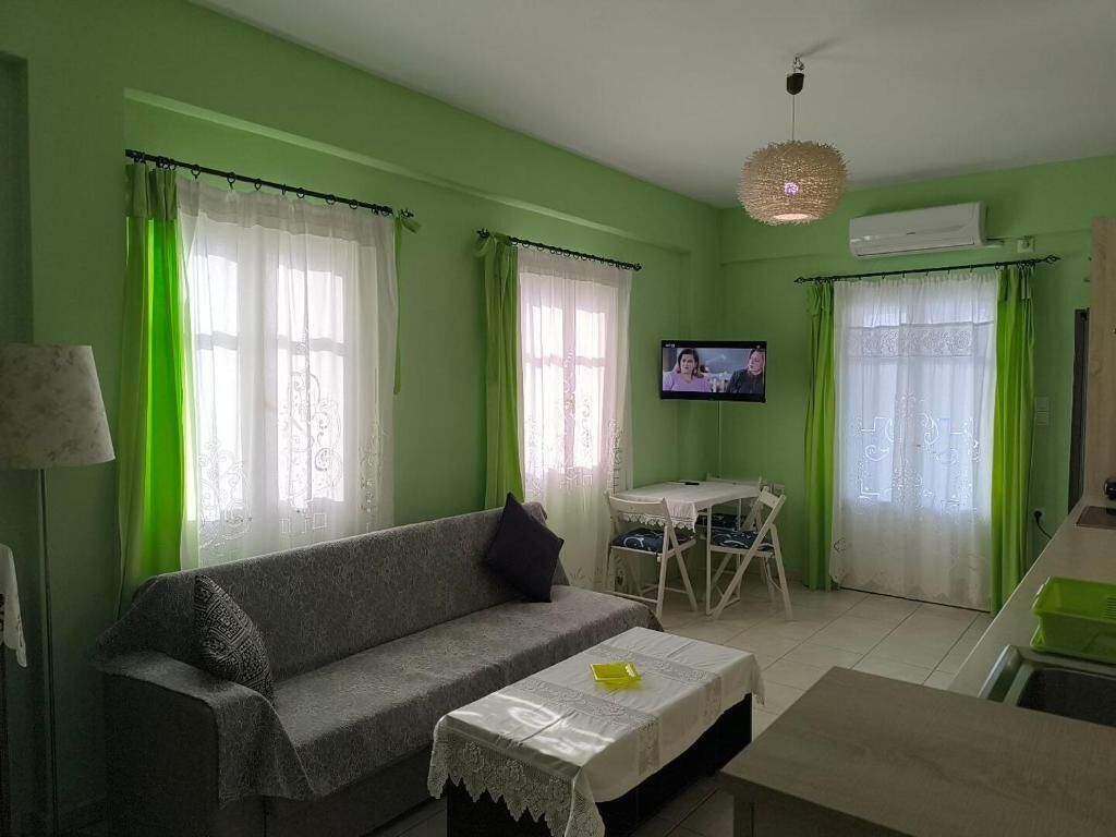 Deluxe-Apartment, Küche, Meerblick | Wohnbereich