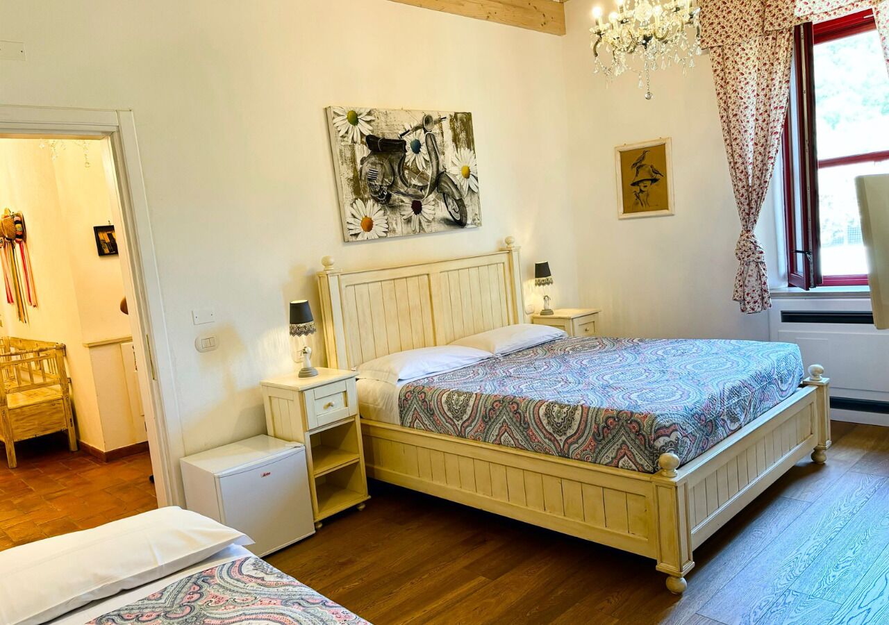 Quarto triplo conforto, vista para o jardim