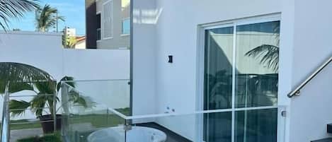 Standard Triple Room, Garden View | Outdoor spa tub