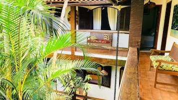 Family Quadruple Room, Garden View | Terrace/patio