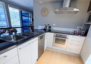 Private kitchen - Waterfront Retreat on the foreshore of the Queen Charlotte (Picton)