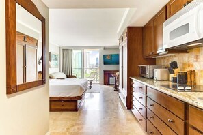Iron/ironing board, WiFi, bed sheets - Bright Central Studio at Luana Hotel + Suites (Honolulu)
