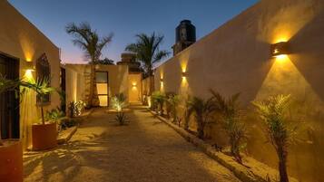 Superior Suite, Patio, Garden View | Property grounds