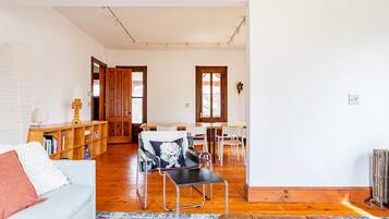 TV, fireplace, books, printers