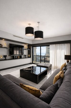 Living area - Grand Suite Oceanview steps to beach and 5th Av. (Playa del Carmen)