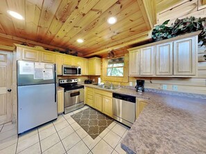 Fridge, microwave, oven, stovetop - Spacious Smoky Mountain Cabin Rental | Sleeps 12 | Game Room & Hot Tub (Pigeon Forge)