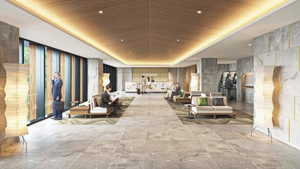 A spacious lobby with a high ceiling, seating areas, a reception desk, and a large window providing natural light. - Daiwa Roynet Hotel Matsue-ekimae (Matsue)