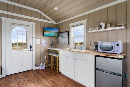 Fridge, microwave, coffee/tea maker, paper towels. Serenity Escape: Calm Cottage