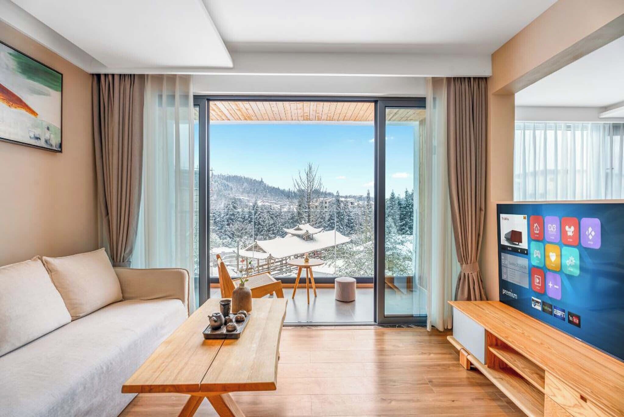 Suite Deluxe, vistas a la montaña | Sala de estar