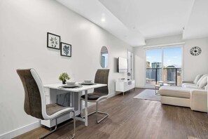 Living area - Sky-High Suite | Pool Table | Walk to Rogers (Edmonton)