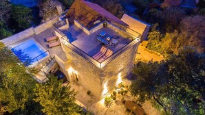 A stone villa with a swimming pool, outdoor seating, and a patio. - in Makarska mit privatem Pool und außergewöhnlic by Interhome (Makarska)