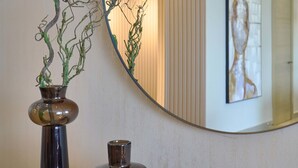A bathroom vanity with a vase, a bowl, and a book. - 3BR Elegant Spot Downtownsd Family Pool (Santo Domingo)