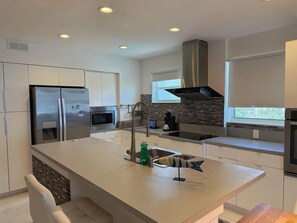 Fridge, microwave, stovetop, coffee/tea maker - Bright 2BR Coastal Suite #12 (Pompano Beach)