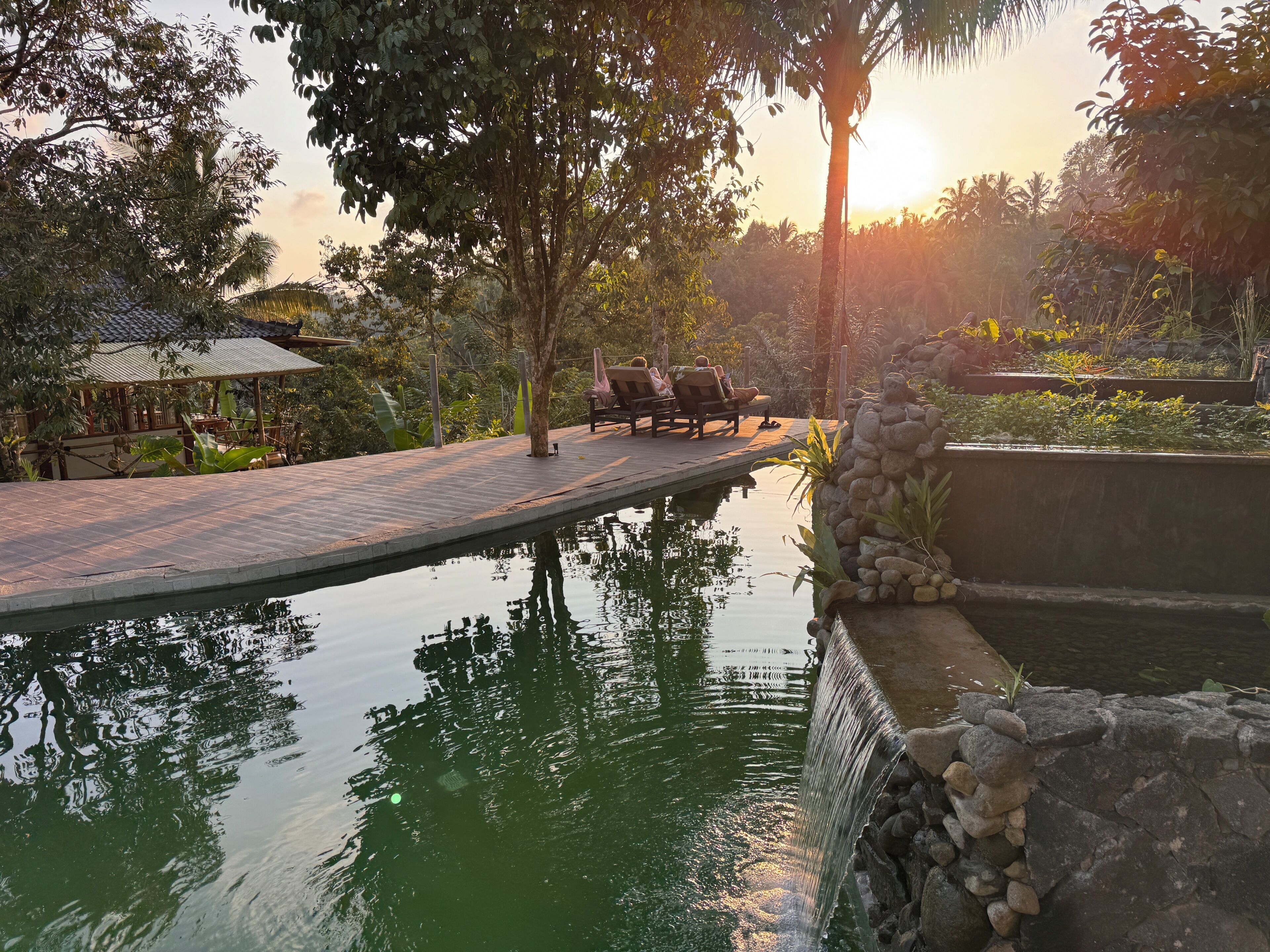 Outdoor pool, open 7:00 AM to 9:00 PM, pool umbrellas, pool loungers