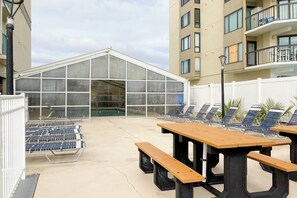 Outdoor dining - Oceanfront condo with private balcony, indoor pool & direct beach access (North Myrtle Beach)