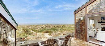Beachfront condo with private patio, beach access, shared pool & hot tub.