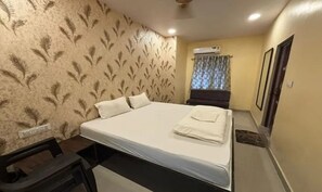 Habitación Deluxe | Sábanas de algodón egipcio, ropa de cama de alta calidad, caja fuerte